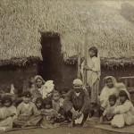 Portrait of a typical Indian family living in a straw house